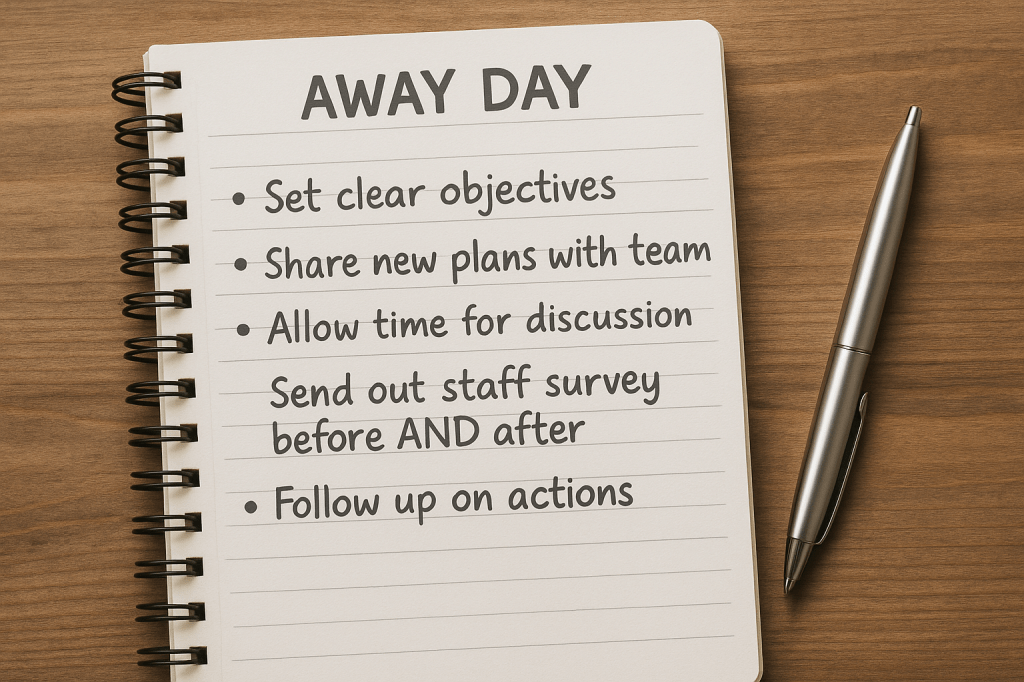 Away day list on a notepad with a pen. Points say set clear objectives, share new plans with team, allow time for discussion, send out staff survey before and after and follow up on actions.